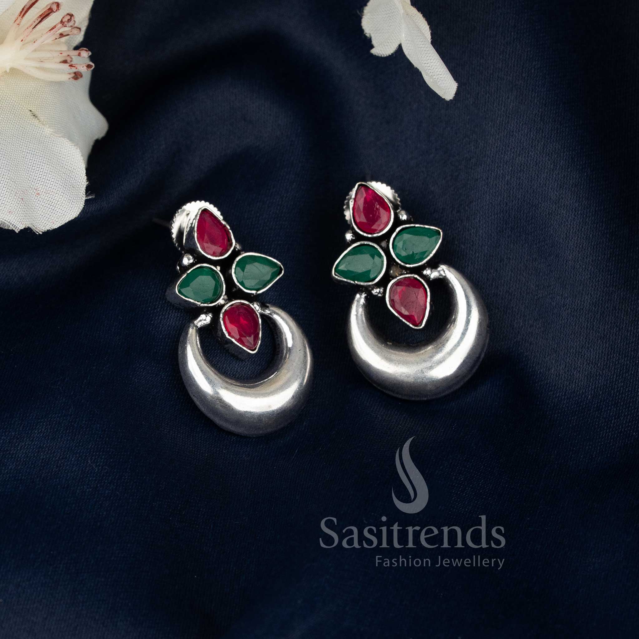 Ruby-green oxidised floral half moon earrings with pearl drops, adding regal charm and ethnic grace to Navaratri saree wear by Sasitrends
