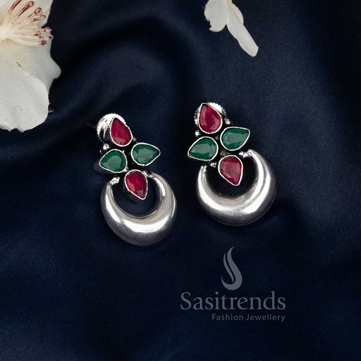 Ruby-green oxidised floral half moon earrings with pearl drops, adding regal charm and ethnic grace to Navaratri saree wear by Sasitrends
