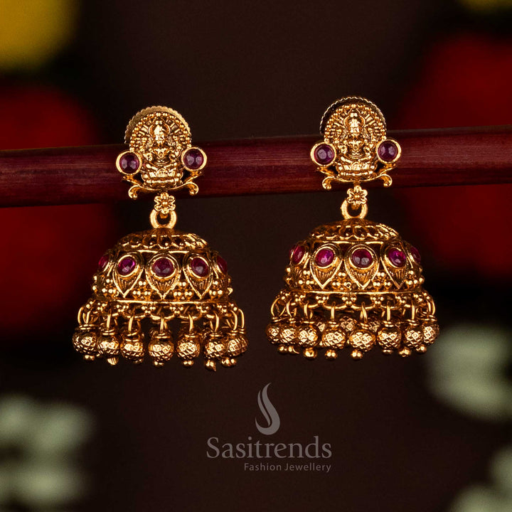 Beautiful Premium Temple Matte Gold Plated Lakshmi Motif Jhumka Earrings with Ghungroo Drops For Traditional Wear