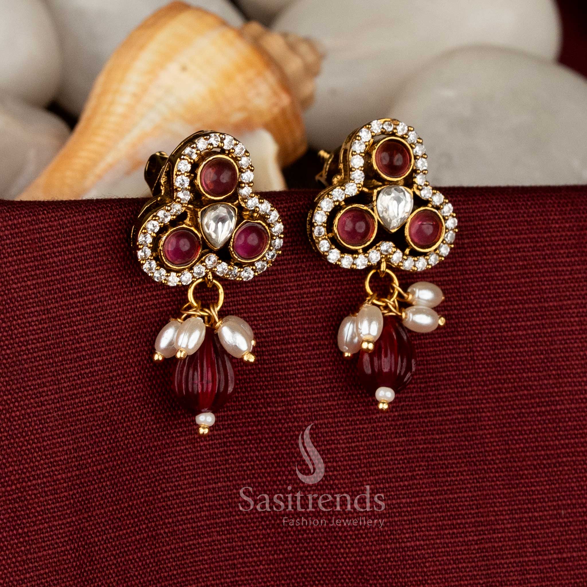 Ruby radiant Victorian triple-lobe stud earrings shimmering with AD stones and refined pearl hangings for bridal elegance – Sasitrends