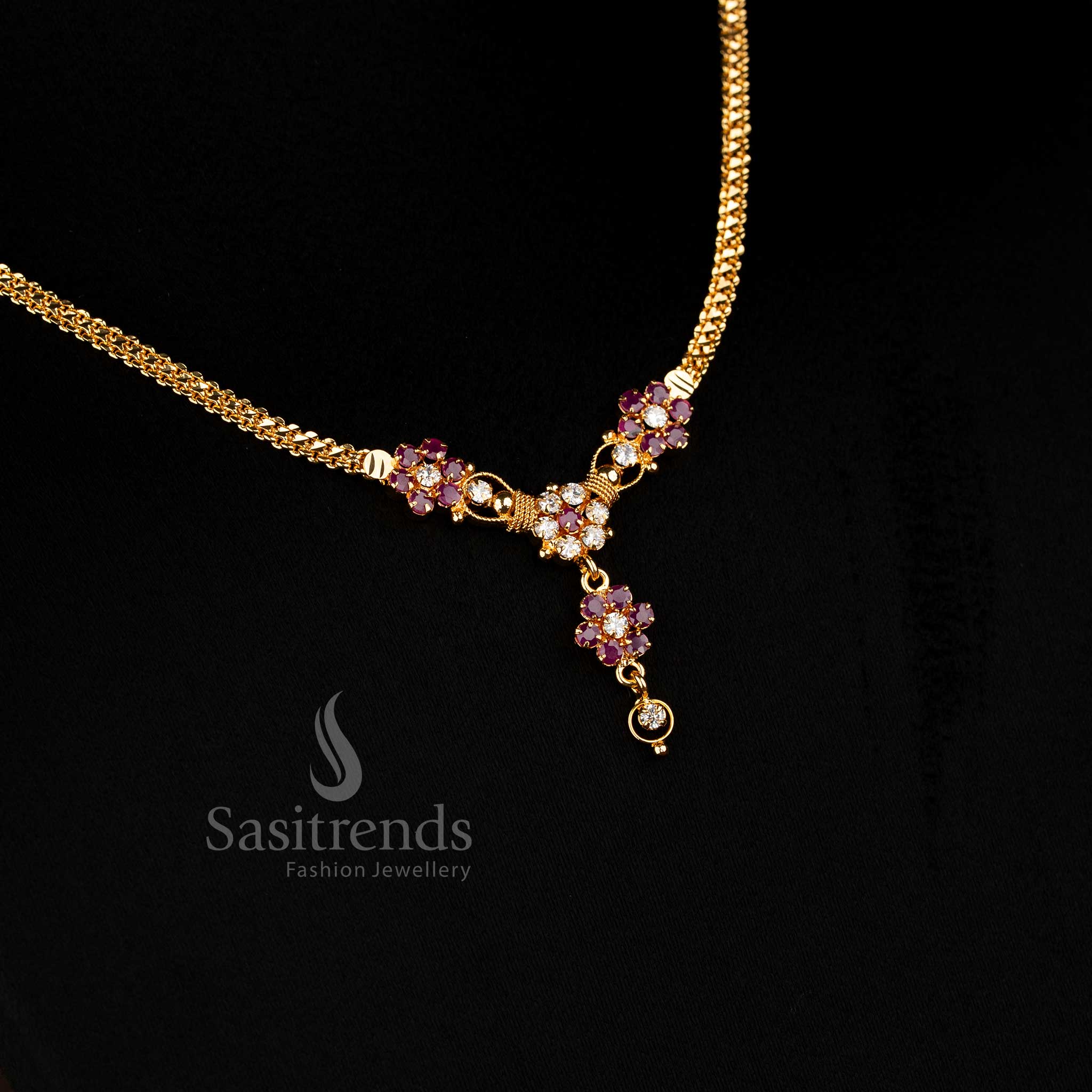 Elegant ruby-white traditional one gram micro gold plated floral pendant necklace, perfect for festive saree wear, showcasing delicate craftsmanship and timeless cultural charm by Sasitrends