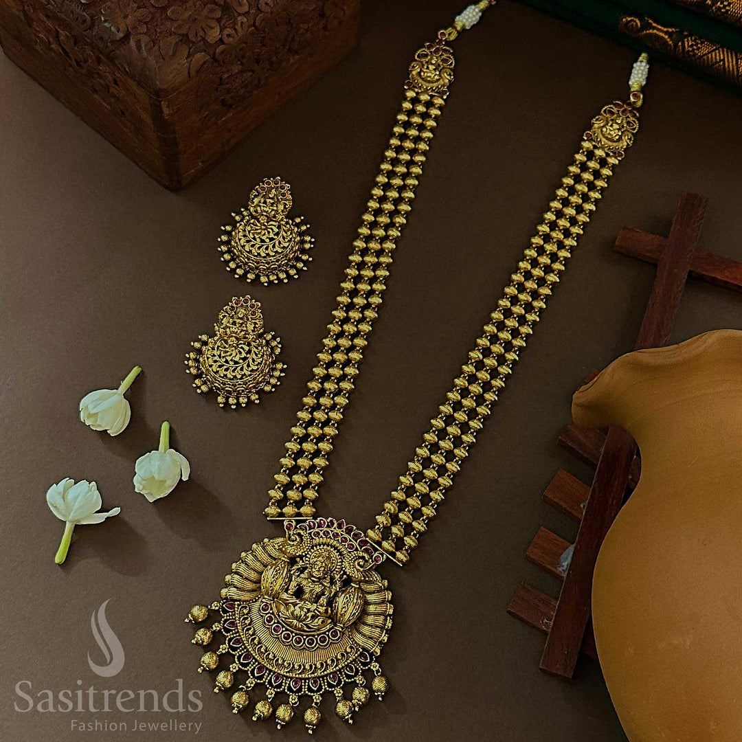Temple Matte Gold Plated Long Necklace Jewellery Set with Three-Layered Bead Lakshmi Peacock Pendant Matching Jhumkas for Women Sasitrends