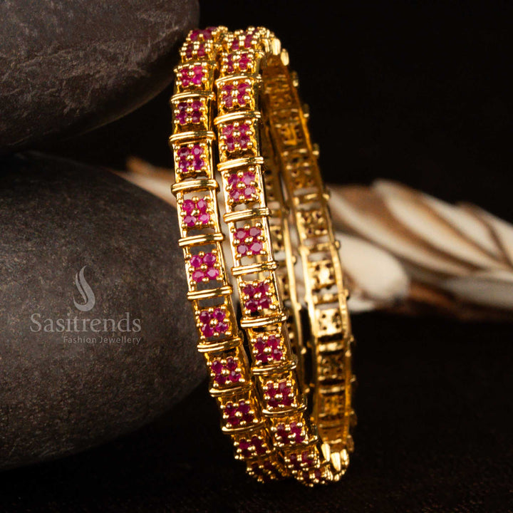 Micro gold traditional bangles pair with floral motifs and ruby American diamond stones – a festive Indian jewellery creation full of vibrant detailing and bridal finesse by Sasitrends