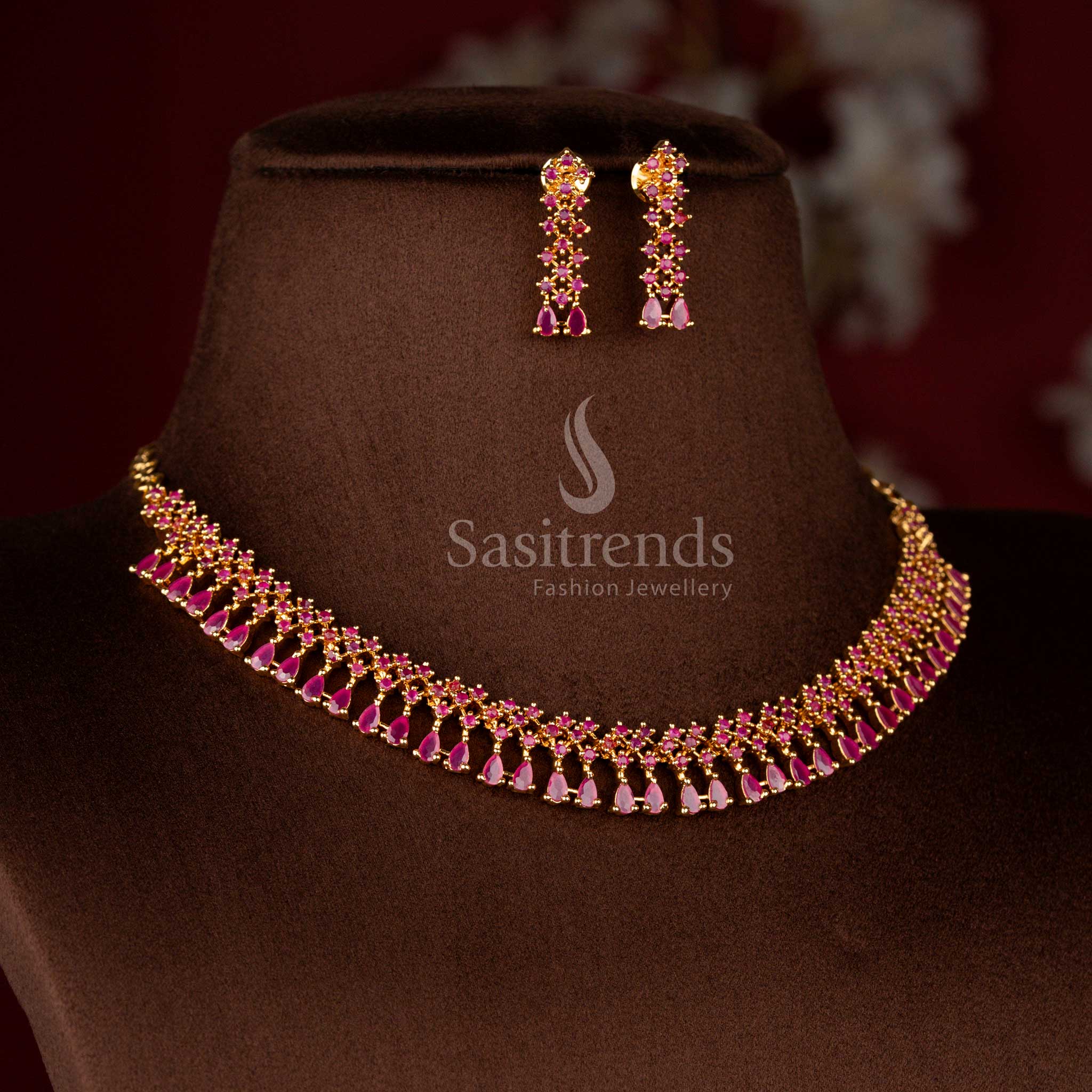 Dazzling micro gold plated American Diamond floral necklace in ruby red with round and pear cut stones – Sasitrends