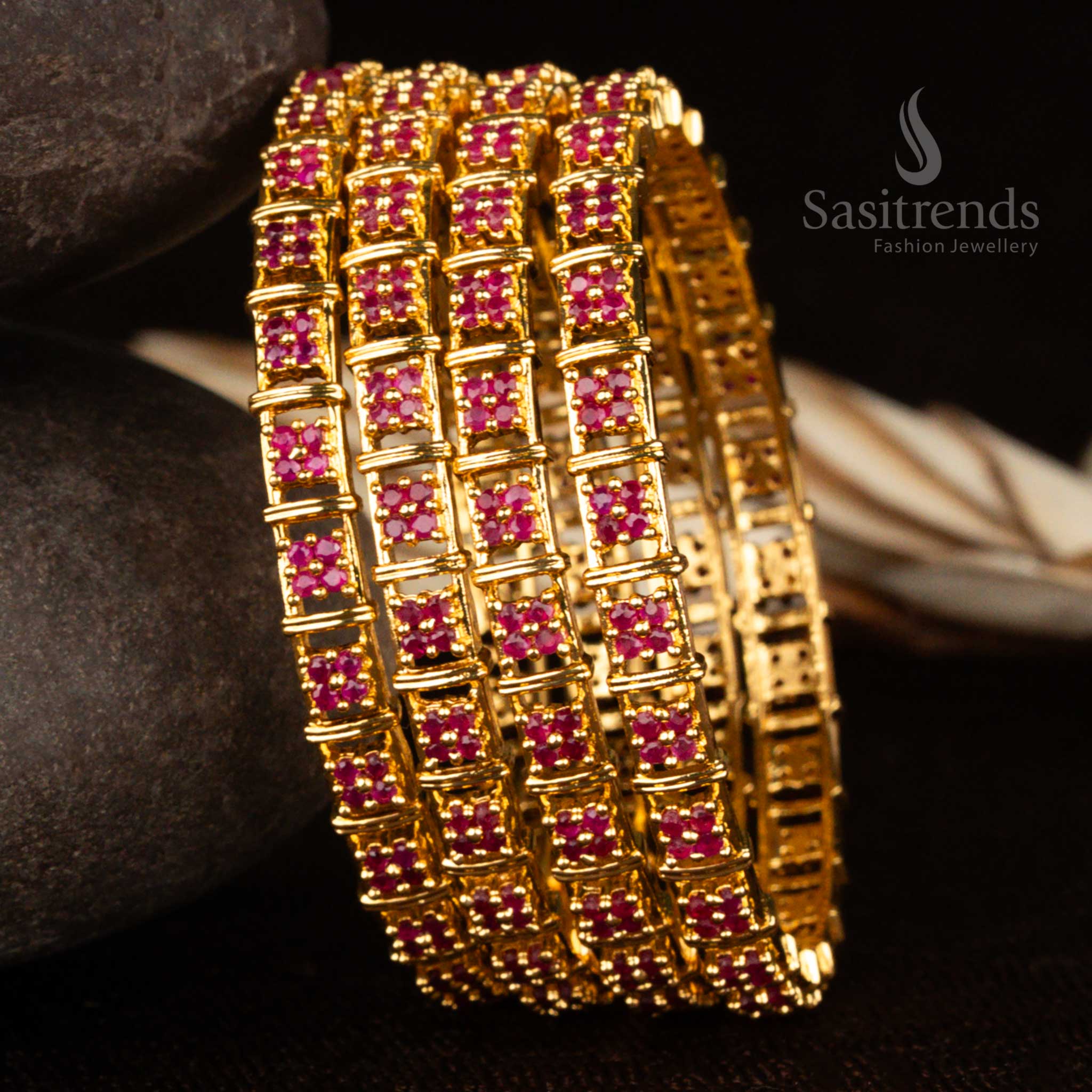 Micro gold  bangles with deep ruby American diamond stones – a striking ethnic jewellery piece with a 1-year guarantee, crafted for regal celebrations by Sasitrends