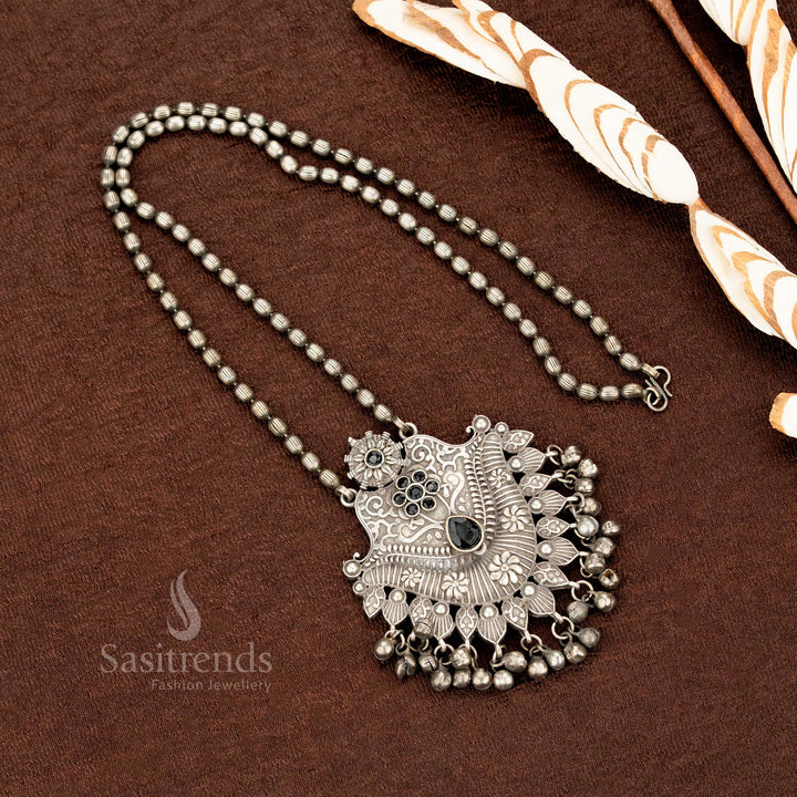 Bohemian black floral pendant necklace in oxidised German silver with vintage-style engraving and traditional ball hangings – a bold tribal jewellery accent from Sasitrends