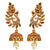 Exquisite peacock-inspired earrings in matte gold finish, showcasing intricate craftsmanship and cultural symbolism