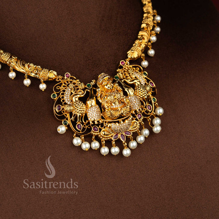 Opulent charm matte finish ornament featuring divine Lakshmi icon framed by artistic peacock carving enriched with colourful multi embellishments for cultural occasions – Sasitrends