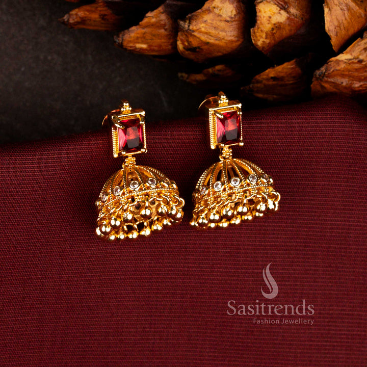 Elegant Sasitrend ruby 24K micro gold plated festive jhumka earrings crafted with layered bead hangings and rich traditional finish