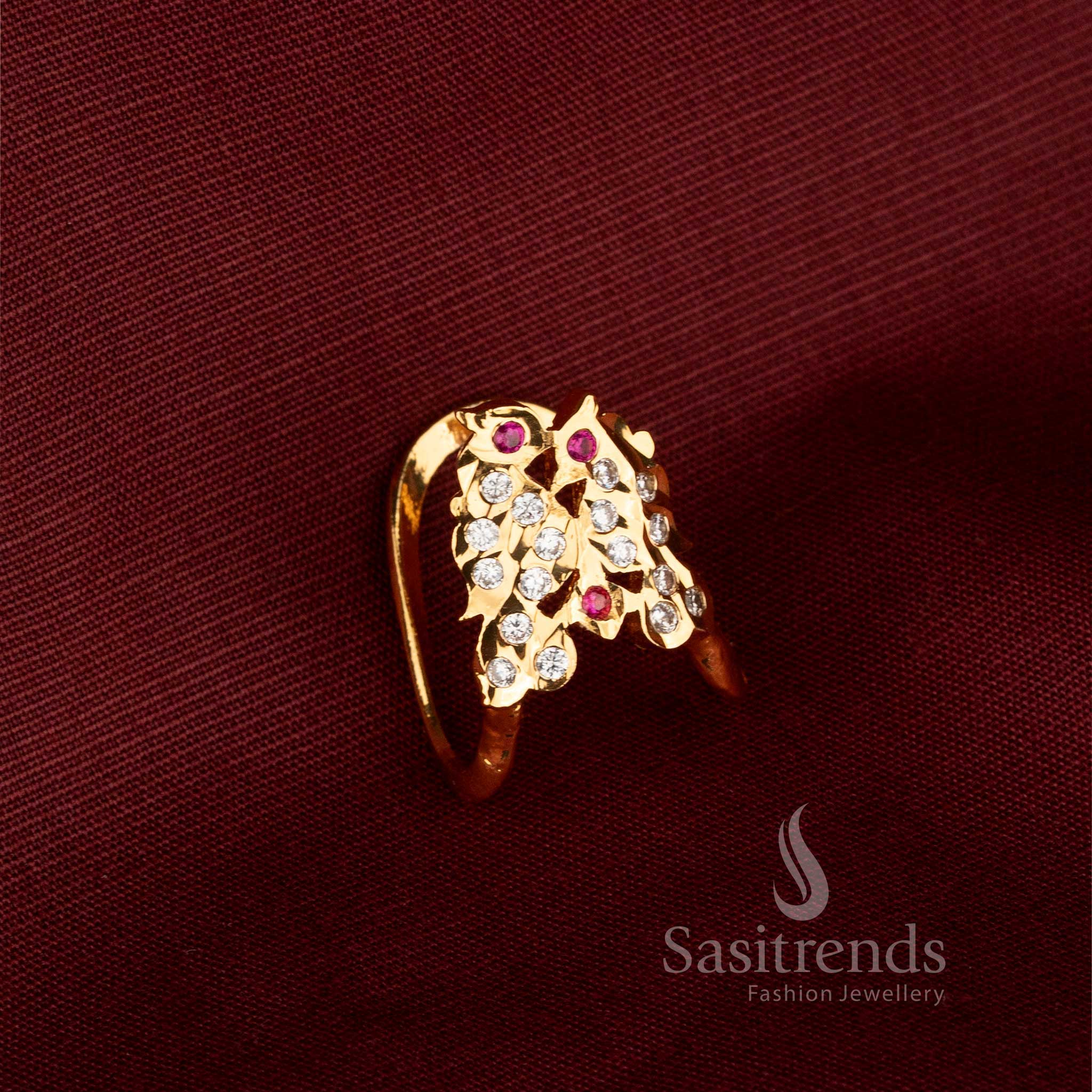Sasitrends Impon Micro Gold Plated Gati Panchaloga Ring featuring a distinctive curved dual-V design with sparkling American Diamond stone accents and an elegant openable structure
