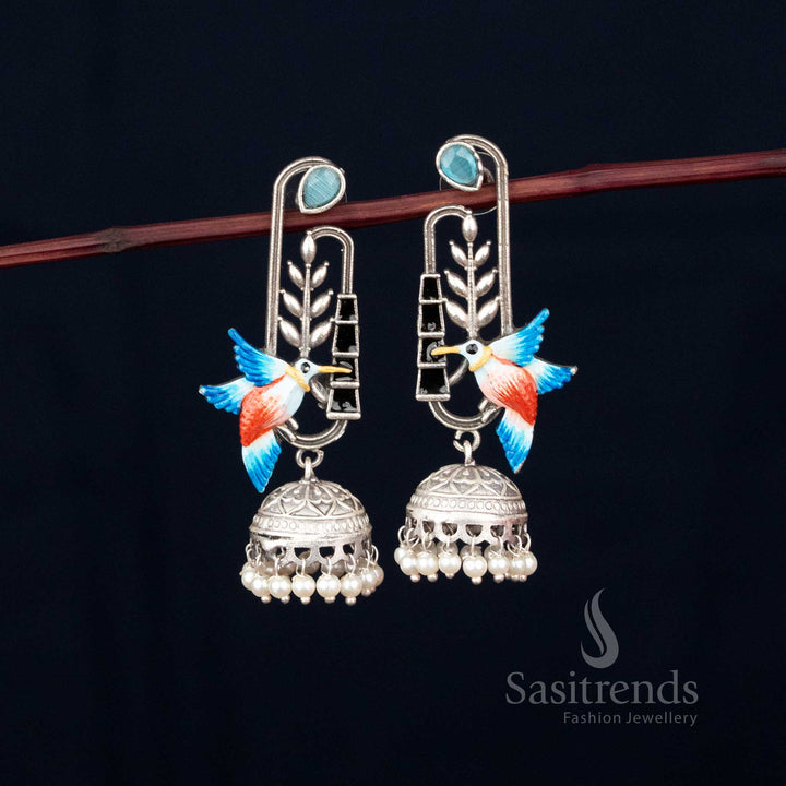 Dreamy oxidised hummingbird and leaf dangler jhumka earrings with pearl accents perfect for Navaratri wear – Sasitrends