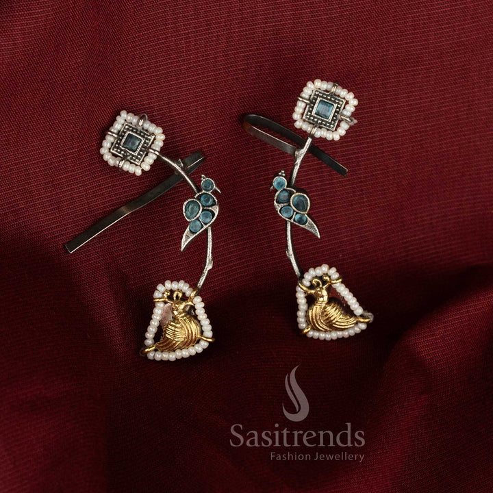 Sky toned antique dual tone oxidised 92.5 silver peacock stone ear cuff earrings with ethereal jewellery - Sasitrends