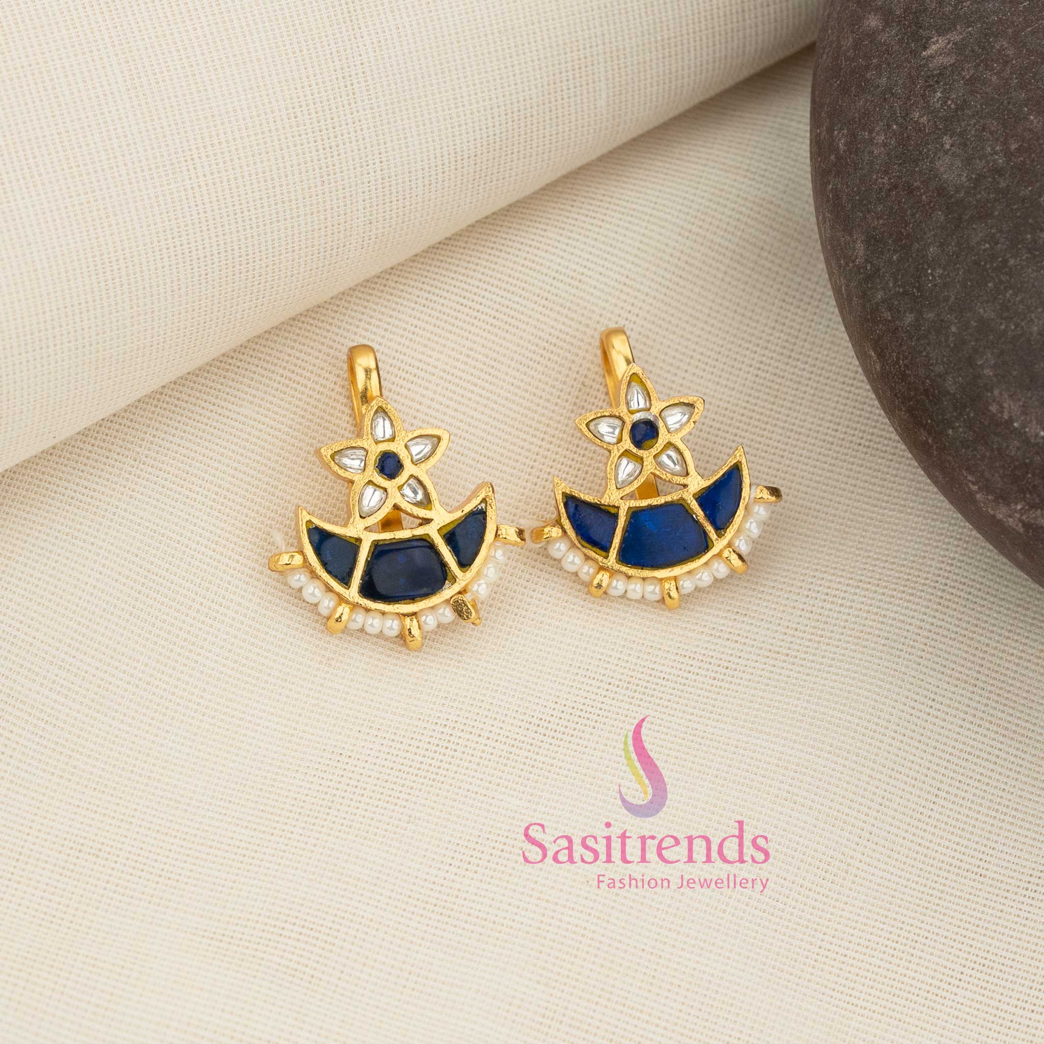 Dreamy white-blue 24K Jadau Kundan crested floral bugadi earcuff earrings accented with pearls, suited for festive parties, traditional get-togethers, and expressive ethnic dressing - Sasitrends