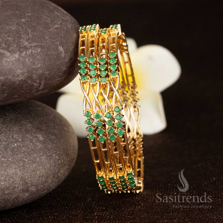 Enchanting green micro gold plated set of four bangles with American diamond stones and graceful twisted artistry - Sasitrends
