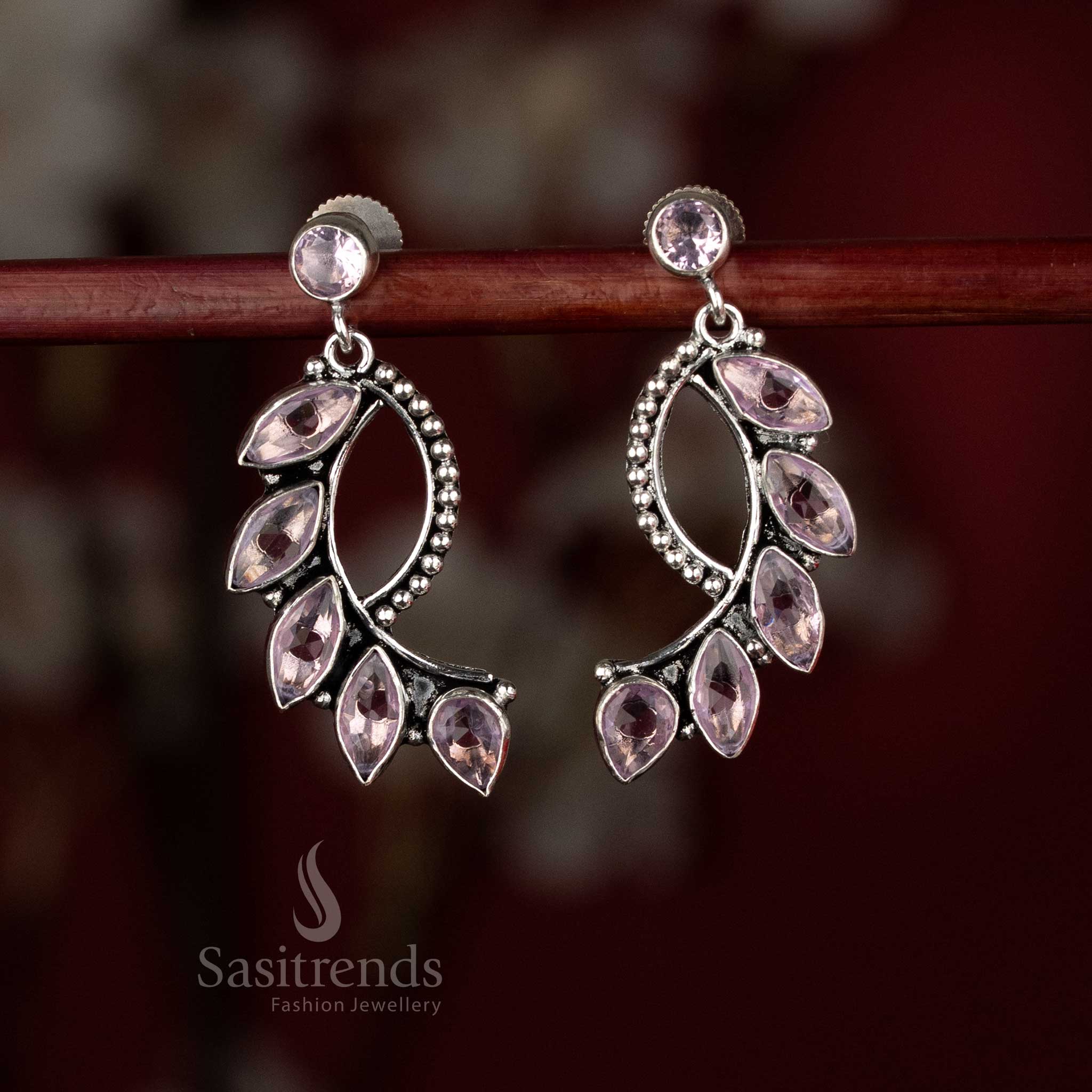 Pastel lavender-pink oxidised S-curve crawler earrings for calm dinner wear – Sasitrends