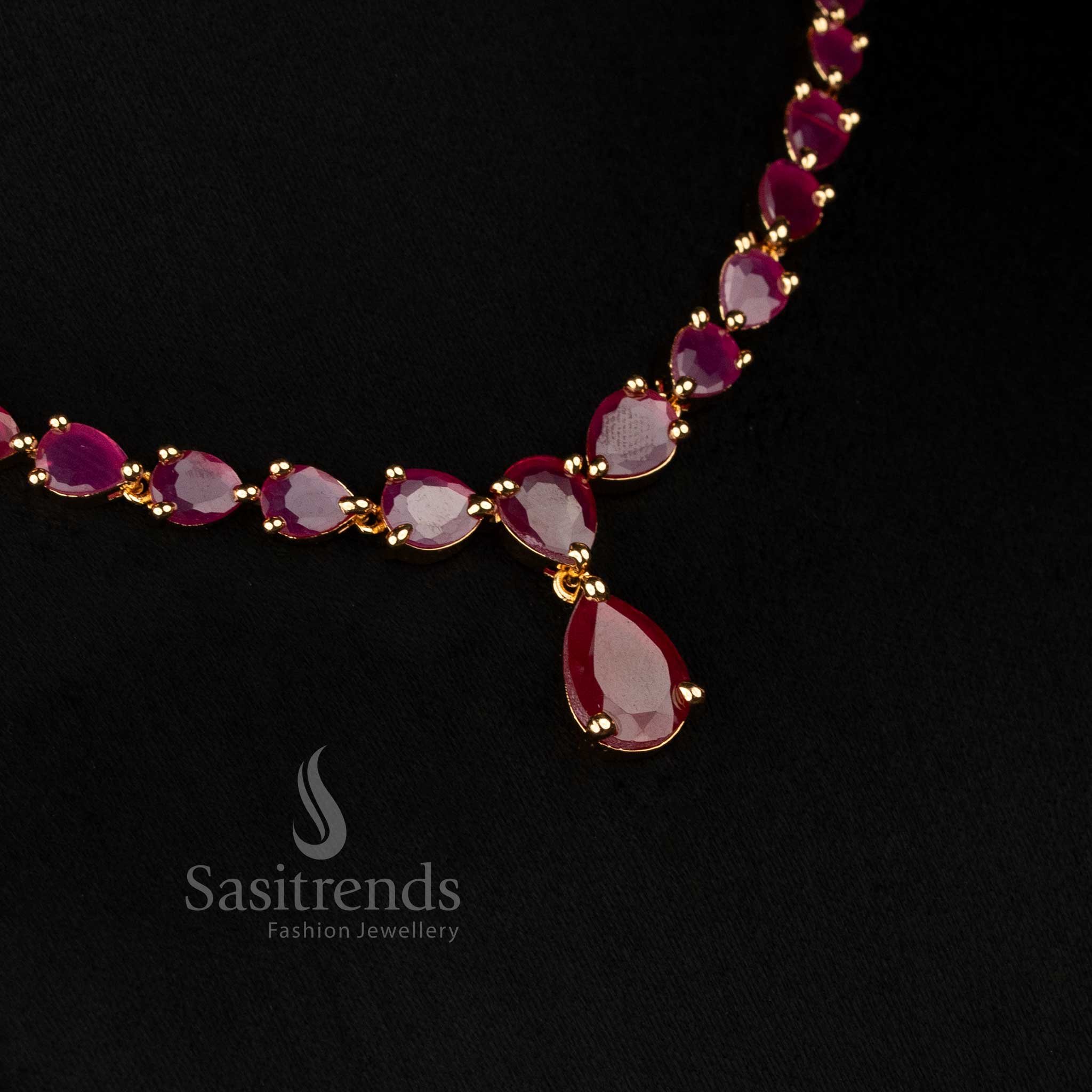 Opulent American Diamond teardrop ruby stone earrings crafted for receptions and glamorous celebrations - Sasitrends