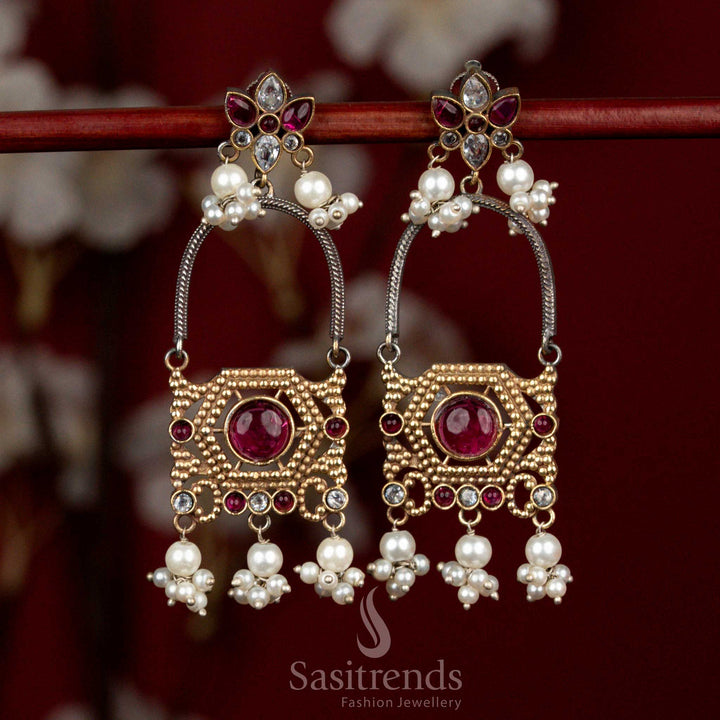 Refined dual tone oxidised silver earrings adorned with white-ruby Monalisa stones, sculpted floral arch motifs and delicate pearl cluster drops for festive ethnic styling - Sasitrends
