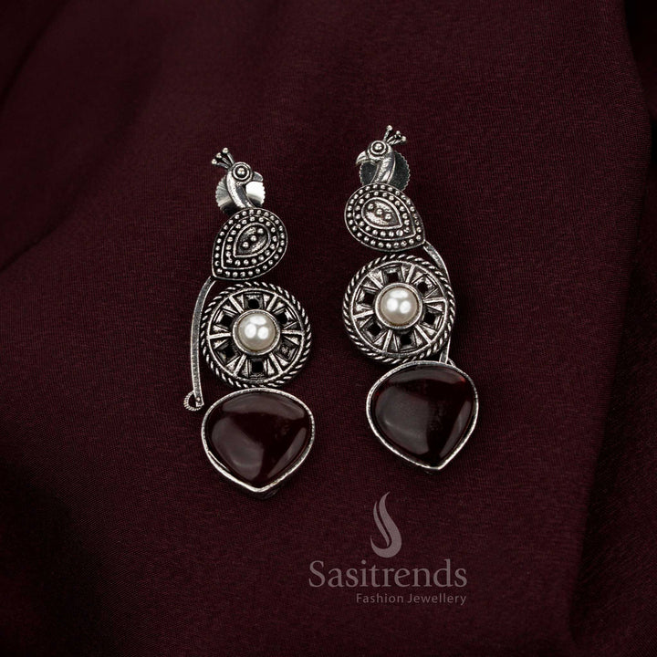 Magnificent maroon oxidised peacock earrings featuring baroque-inspired artistry crafted with pearl drops for eternal cultural charm aristocratic refinement and heritage jewellery grace – Sasitrends