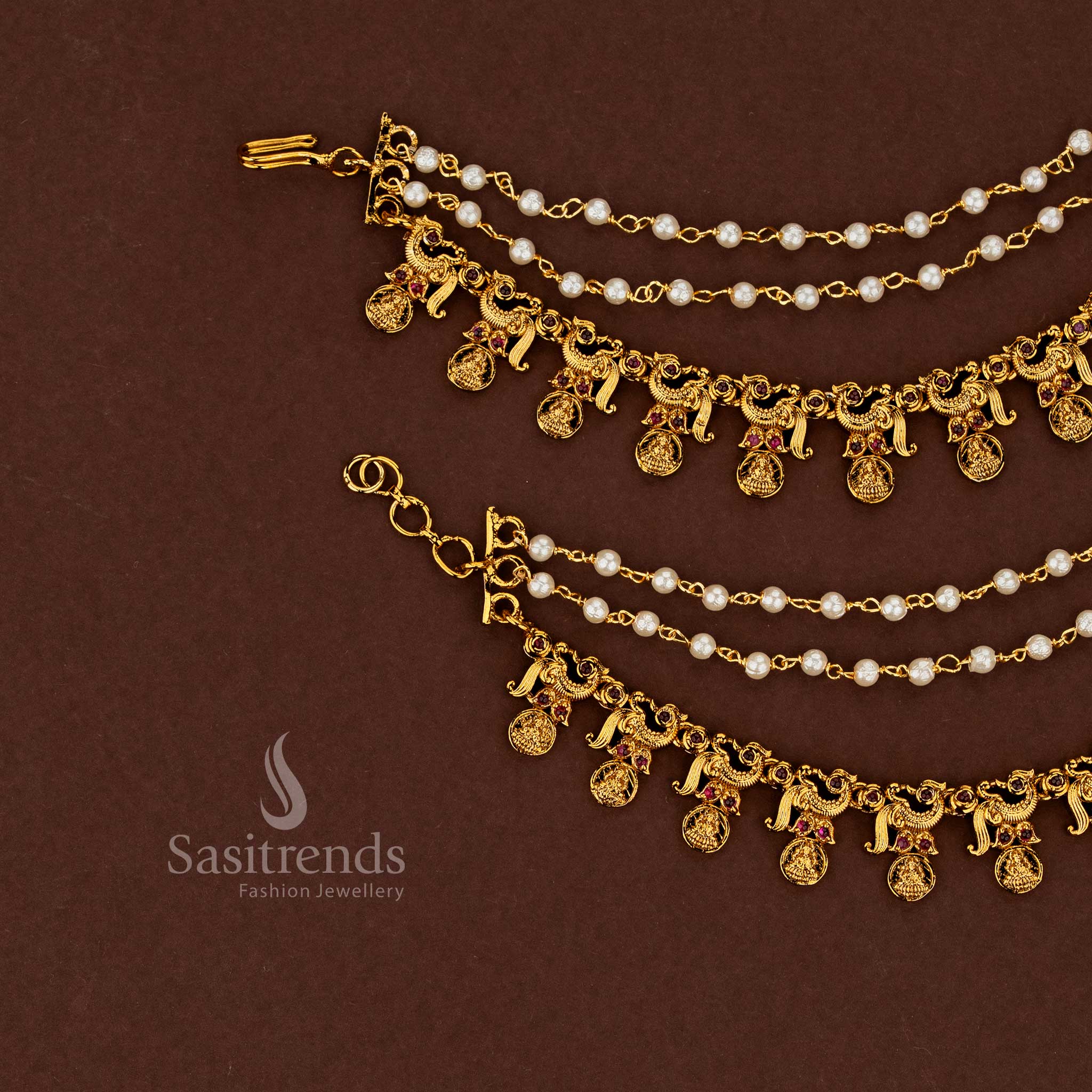 Imperial peacock and Lakshmi motif temple matte gold plated American diamond matils studded with intense ruby stones and cascading pearl drapes for bridal wedding magnificence - Sasitrends