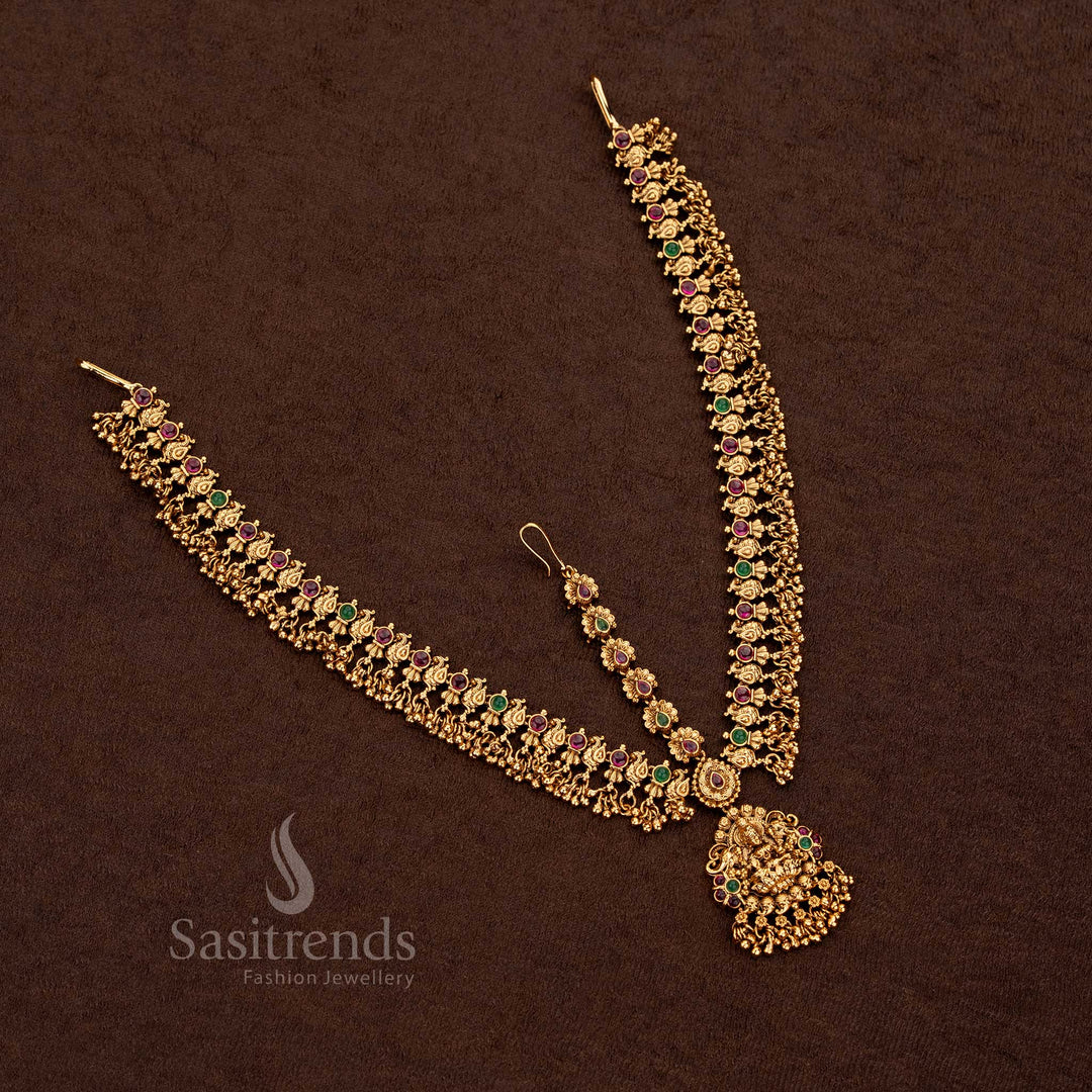 Majestic matte gold plated Lakshmi peacock three layer tikka perfect for wedding and temple functions - Sasitrends