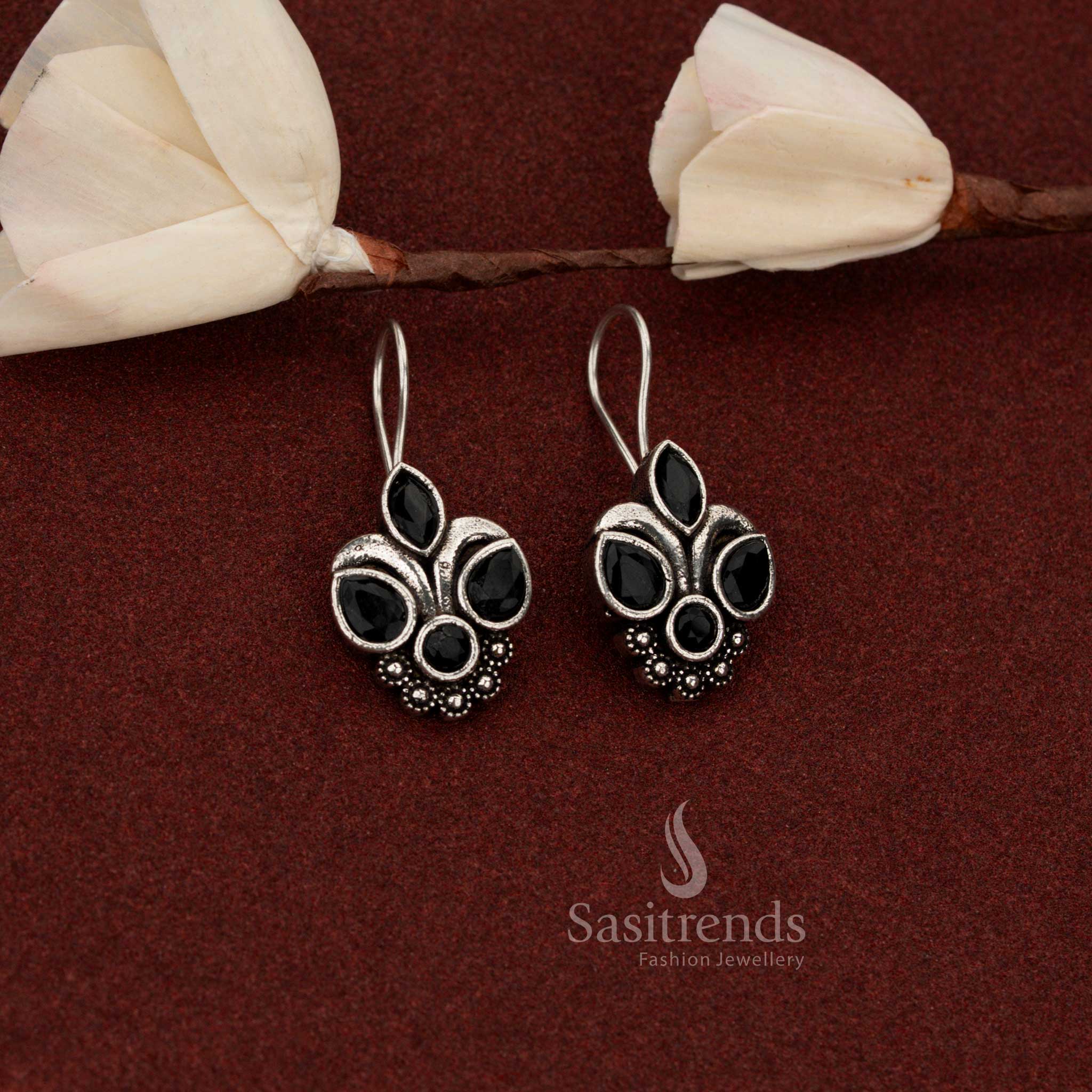 Bold oxidised silver trifoliate floral stone fish hook earrings in black finish perfect for evening brunches – Sasitrends