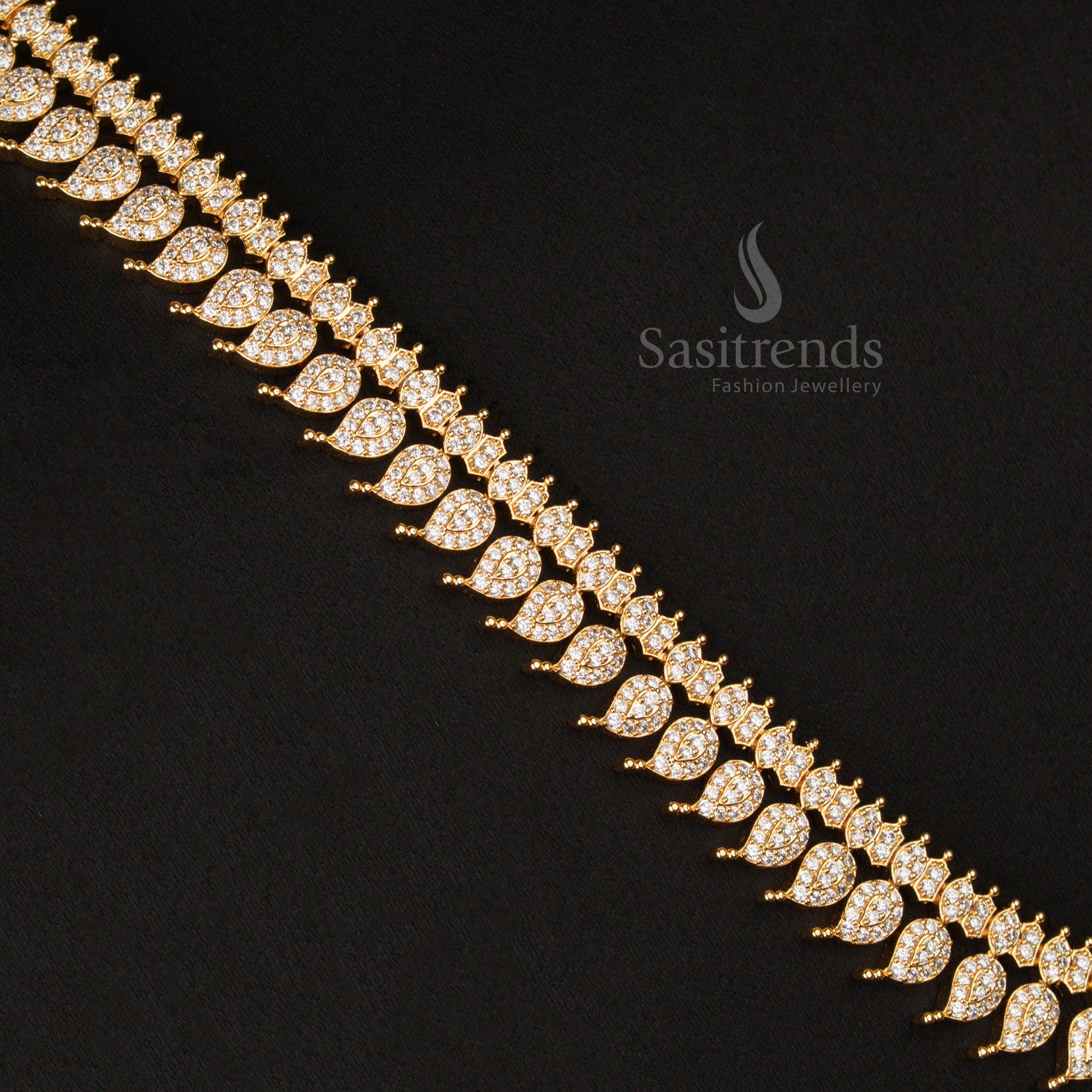 American Diamond gold plated leaf mango short haram necklace set, showcasing glowing ivory-white stones