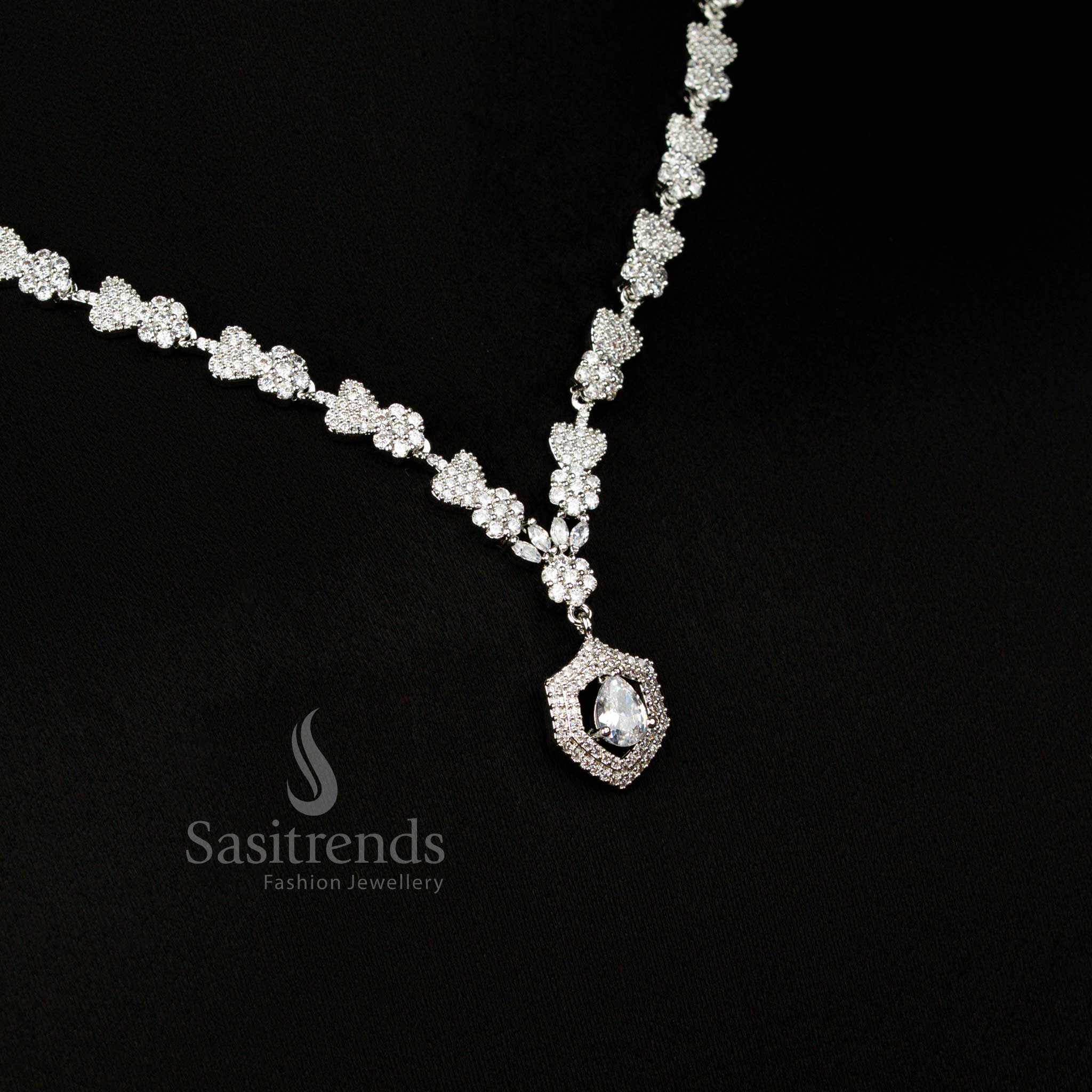 Chic American Diamond rhodium silver plated heart and floral white necklace with teardrop stone pendant for stylish evening and party occasions – Sasitrends