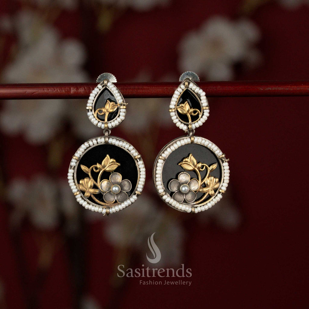 Opulent oxidised German silver drop earrings with pearl border and bold black touch suited for casual wear and office dressing – Sasitrends
