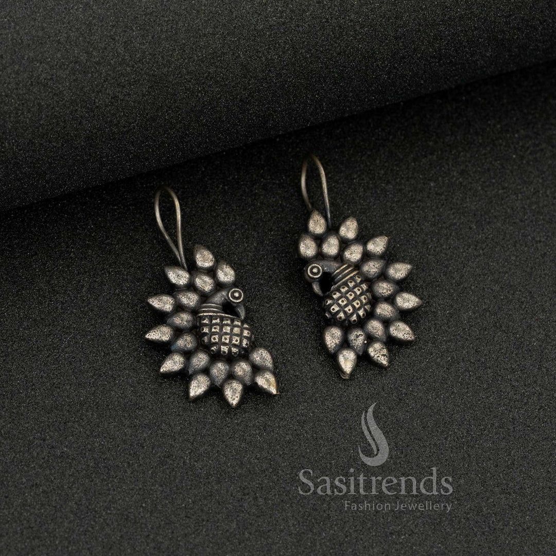 Attractive antique-finish oxidised silver peacock stud earrings with detailed feathers – perfect for casual wear with an ethnic touch – Sasitrends