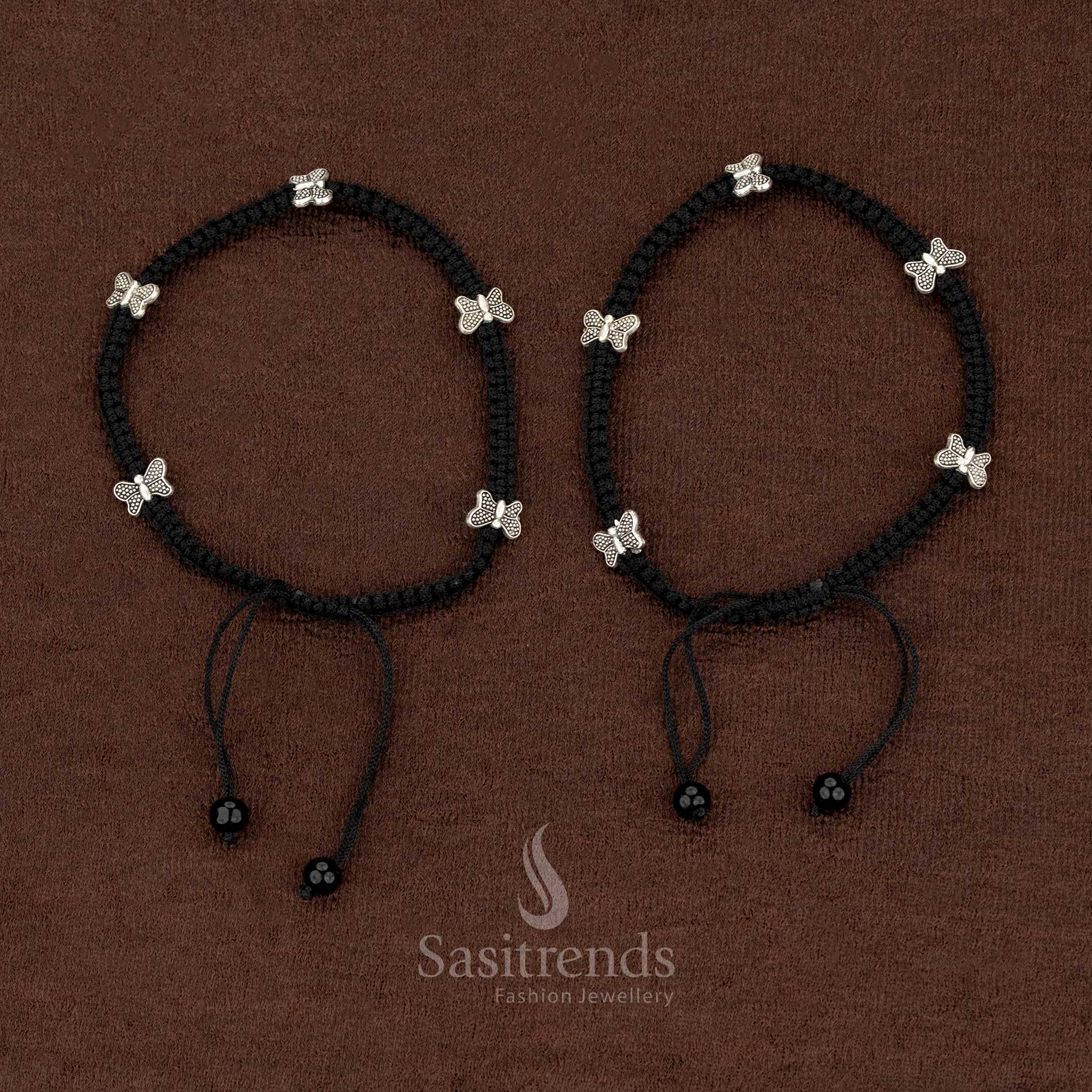 Graceful oxidised black thread anklet with butterfly charm, stranded design perfect for casual street style and cultural day wear – Sasitrends