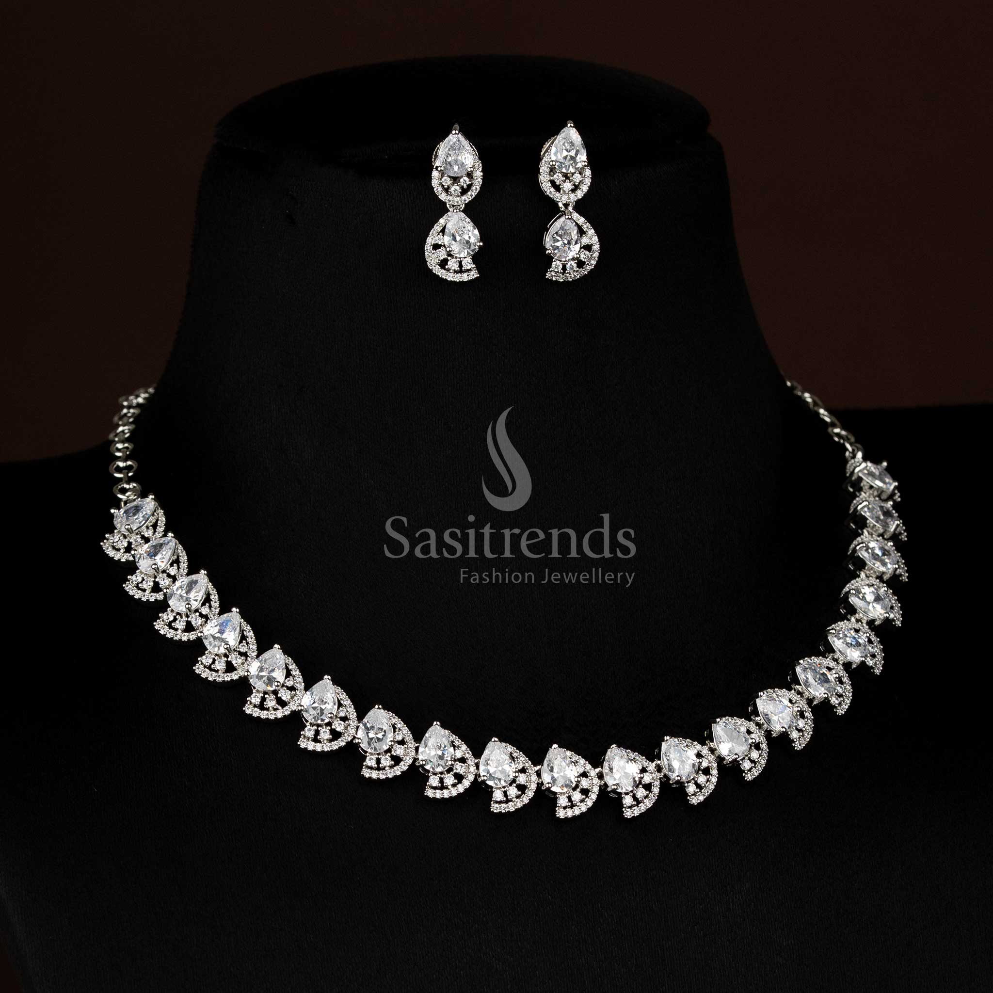 Graceful white teardrop loop design rhodium silver necklace jewellery set with shimmering American diamonds - Sasitrends