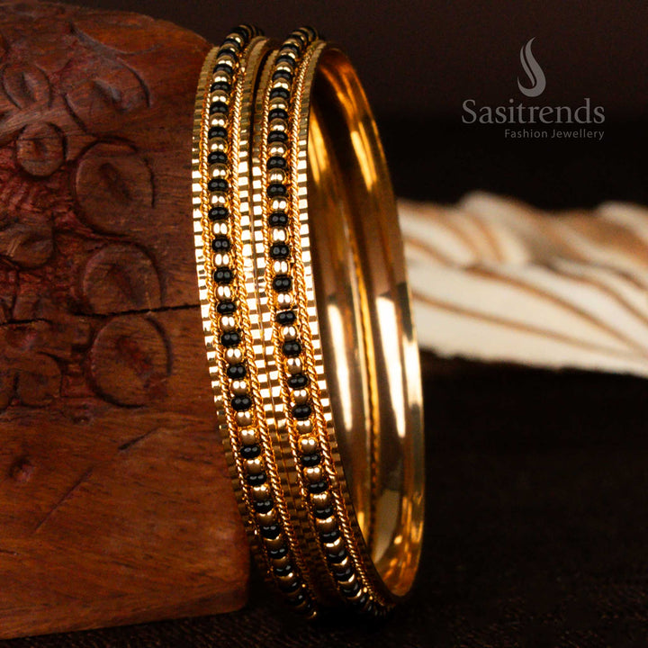 Regal look traditional micro gold plated black bead bangles for women inspired by classic temple jewellery motifs, radiating timeless beauty – online exclusive designer piece by Sasitrends