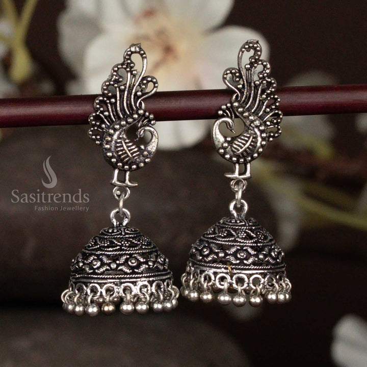 Stylish Oxidised Peacock Top Dome Jhumka Earrings with Floral Embossed Pattern For Special Wear - Sasitrends