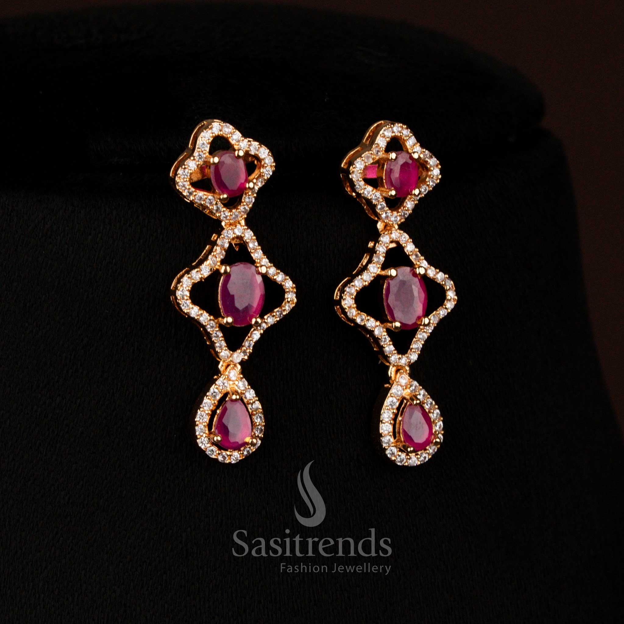 Graceful micro gold plated earrings crafted with white-ruby floral stones and American diamond – Sasitrends