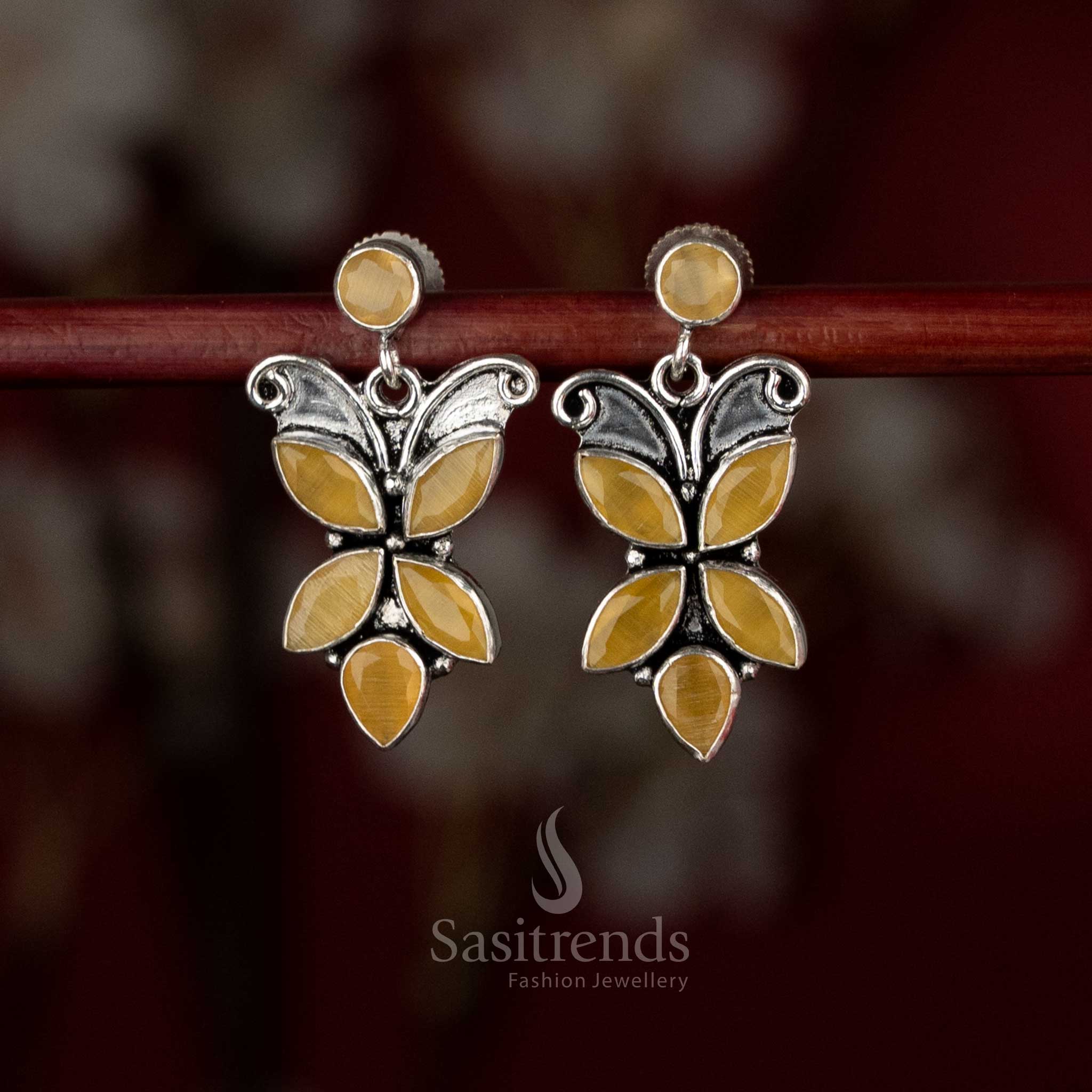Golden yellow oxidised butterfly earrings with light flow for upbeat styling – Sasitrends