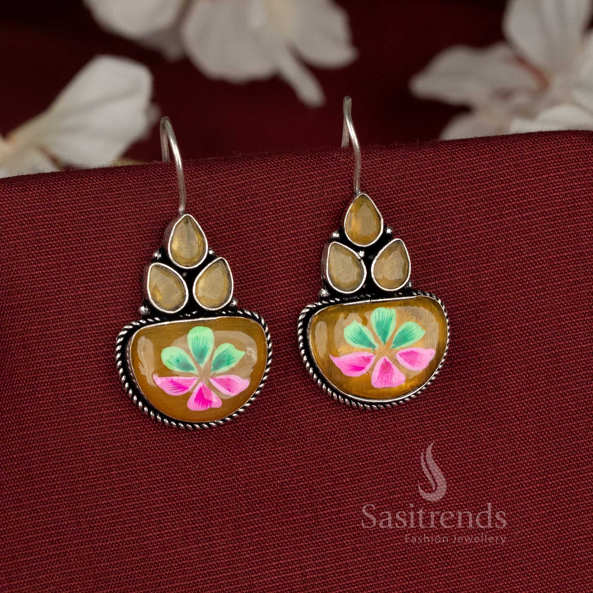 Honeydrop oxidised earrings showcasing yellow Monalisa stone florals and stylish hand-painted touch – Sasitrends