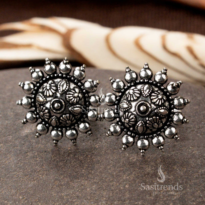 Floral crescent oxidised toe ring with adjustable fit and antique silver shine, reflecting feminine elegance and traditional foot ornament style by Sasitrends