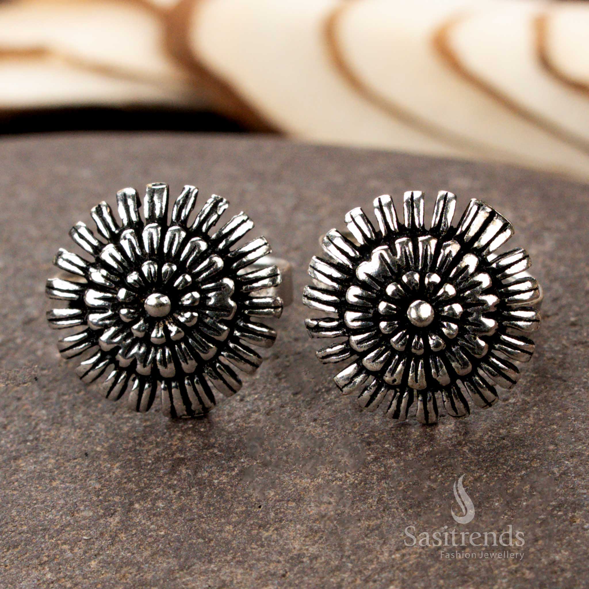 Adjustable oxidised silver toe ring with lotus petal design, featuring hand-etched vintage finish and sacred ethnic symbolism in graceful foot jewellery styling by Sasitrends
