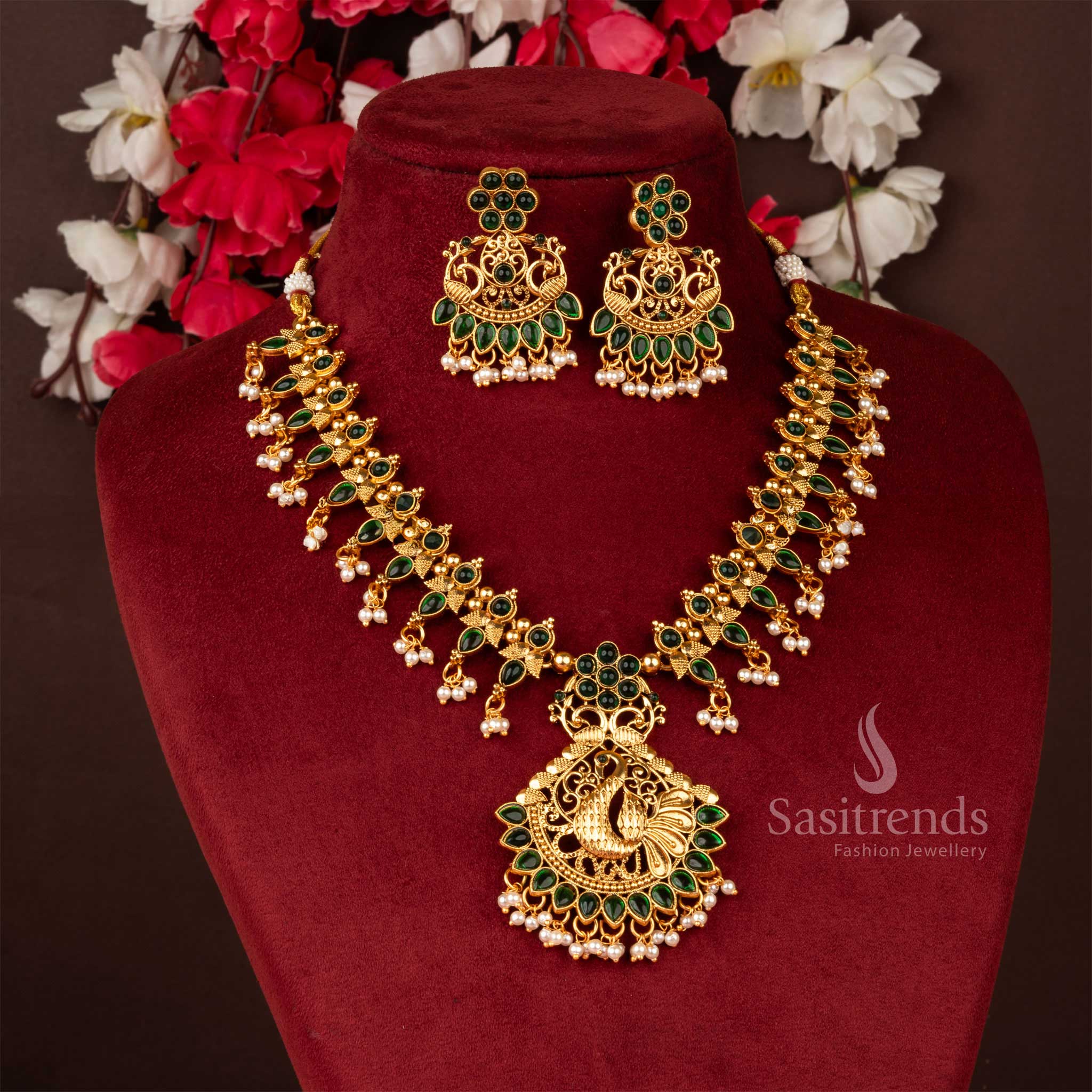Elegant green matte gold necklace with peacock floral pendant, a designer jewellery set perfect for wedding and festive occasions - Sasitrends