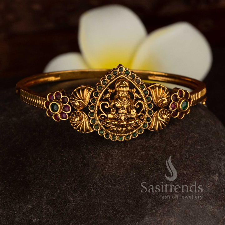 Regal harmony matte gold plated floral teardrop Lakshmi AD green ruby openable kada bracelet with cultural elegance jewellery - Sasitrends
