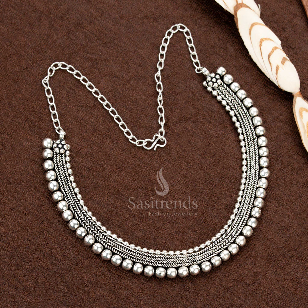 Regal handcrafted oxidised German silver choker necklace with dual-chain detailing and intricate ball motifs, an elegant ethnic jewellery piece for cultural events - Sasitrends