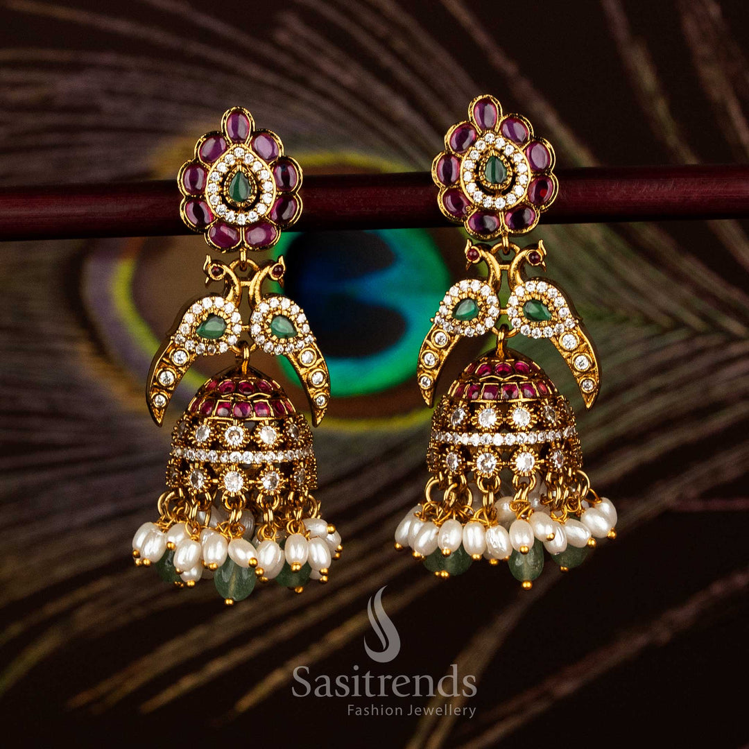  Traditional matte gold plated peacock jhumka earrings with bell dome – Sasitrends