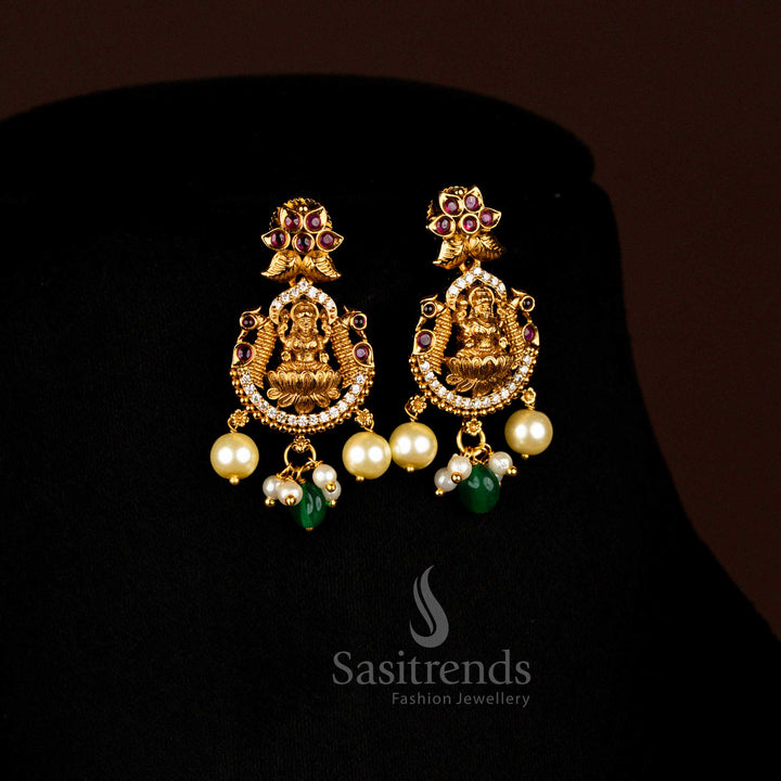 Elegant Handcrafted Matte Gold Lakshmi Temple Earrings Set With White-Ruby Pearl And AD Stones Perfect For Wedding And Festivals - Sasitrends