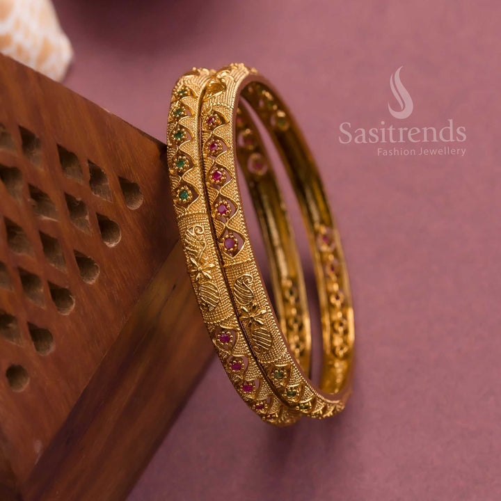 Gorgeous Temple Matte Gold Plated Bangles with Floral and Leaf Pattern, Studded with Ruby Green AD Stones | Sasitrends