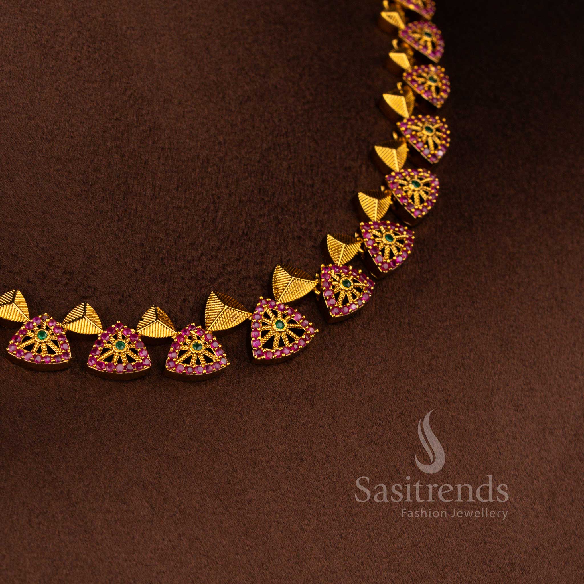 Matte gold polished temple necklace jewellery set decorated with AD stones in elegant ruby green colour combination – Sasitrends