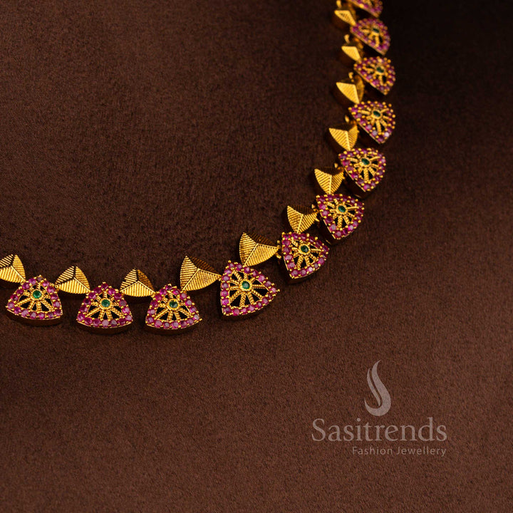Matte gold polished temple necklace jewellery set decorated with AD stones in elegant ruby green colour combination – Sasitrends