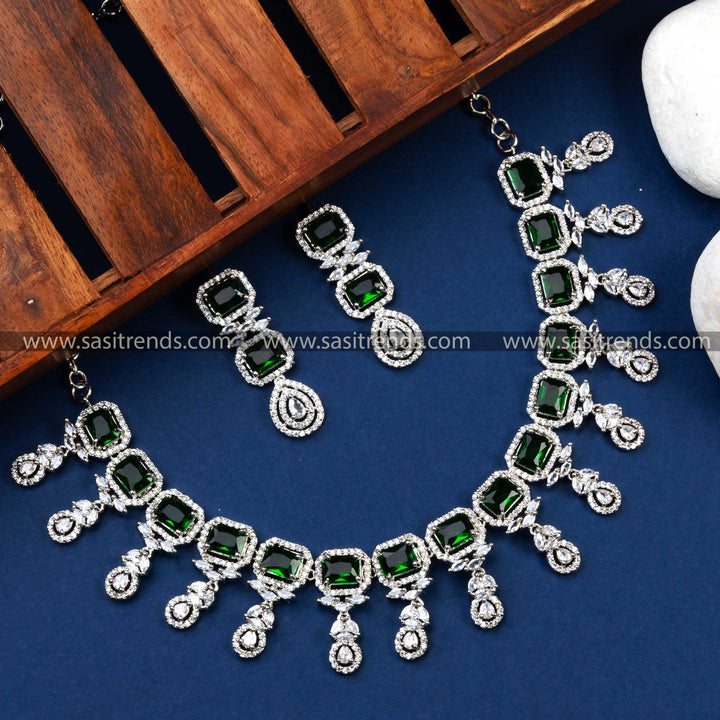 Rhodium Silver Plated Green Stone Necklace Set with Floral Design - Add Glamour to Your Look with This Beautiful AD Green Stone Jewelry Set.