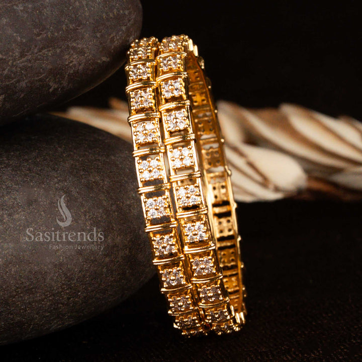 White CZ floral bangle design in fine micro gold polish featuring classic Indian traditional styling – a graceful and versatile piece of elegant ethnic jewellery ideal for bridal and festive occasions by Sasitrends