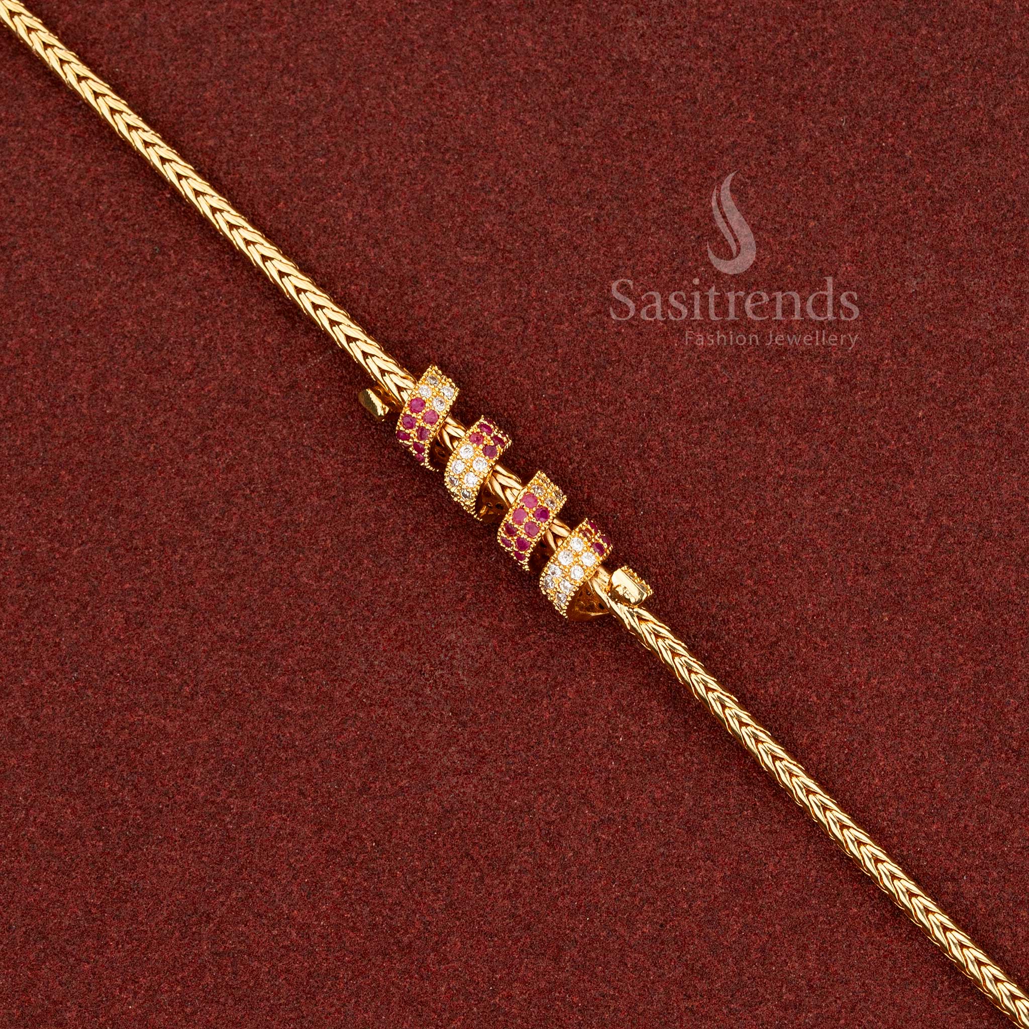 Radiant white-ruby micro gold spring Mugappu chain enriched with AD accents, ideal for festive sarees and grand ceremonial ensembles – Sasitrends
