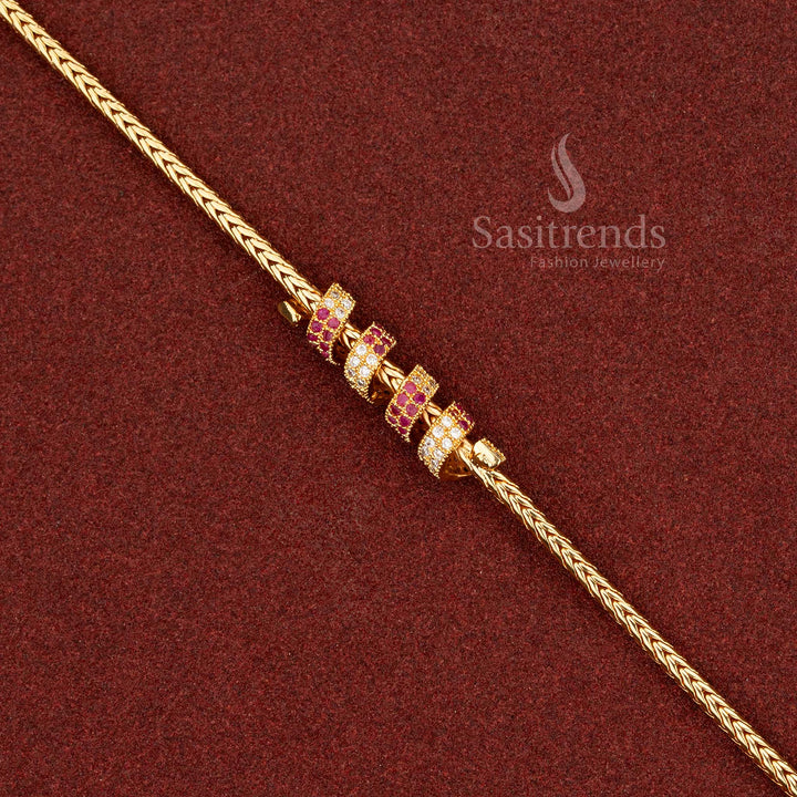 Radiant white-ruby micro gold spring Mugappu chain enriched with AD accents, ideal for festive sarees and grand ceremonial ensembles – Sasitrends